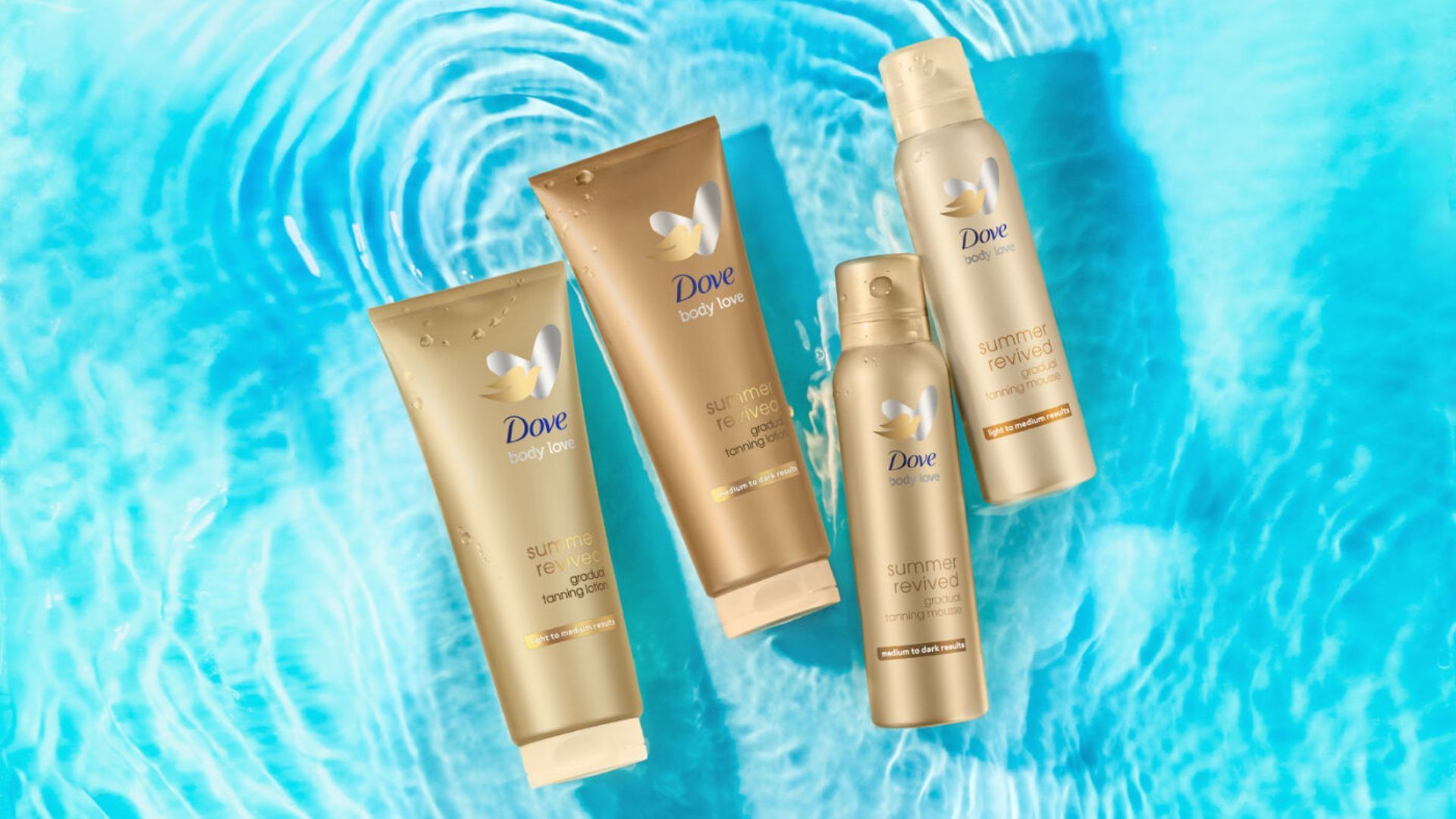 Tubes and mousse cans of Dove Summer Revived gradual tan, Dove’s tanning moisturiser designed to give skin a summer glow.