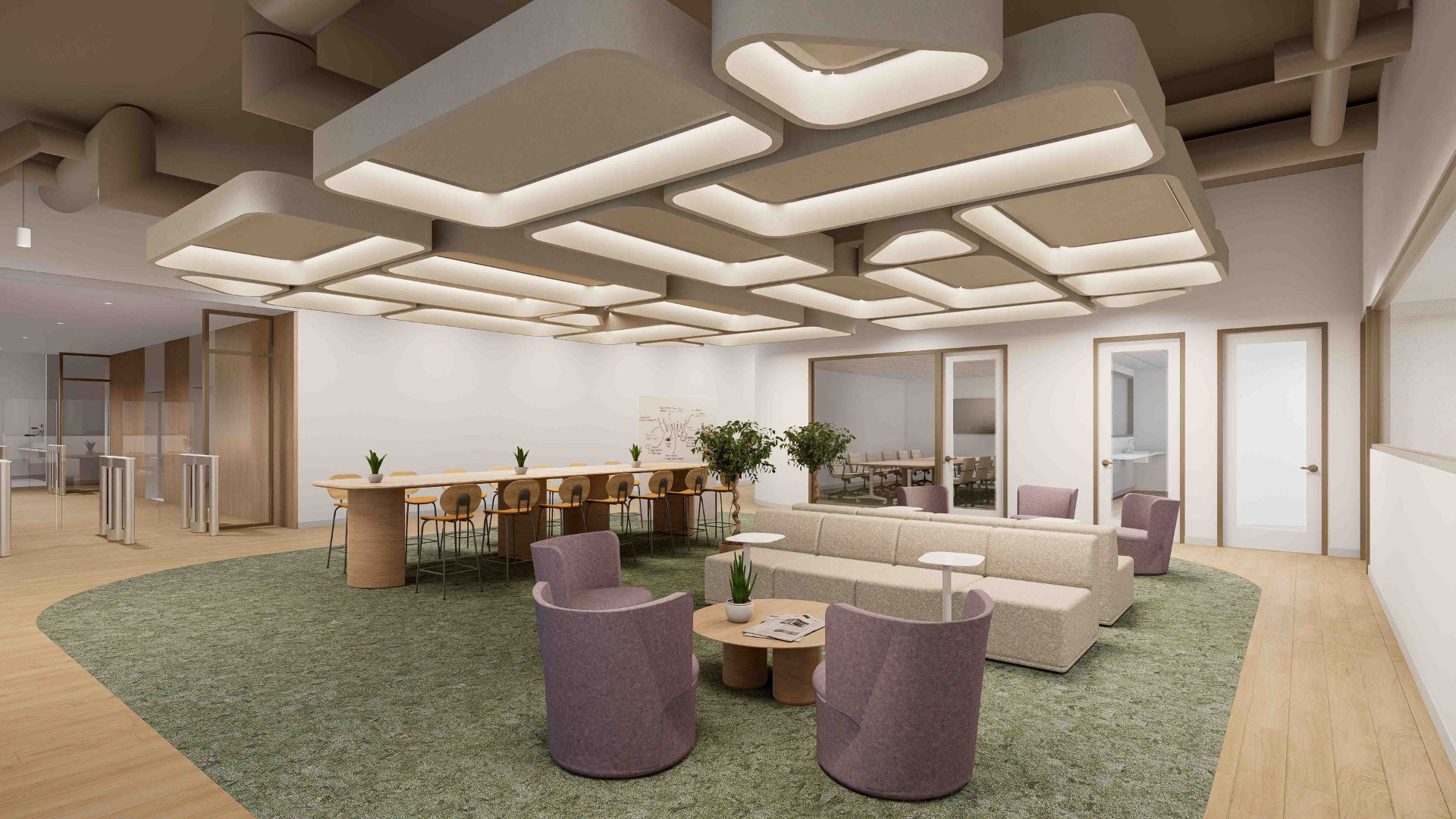 Collaborative office space with long wood high tables, soft seating around a coffee table, and cream and wood color palette.