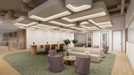 Collaborative office space with long wood high tables, soft seating around a coffee table, and cream and wood color palette.
