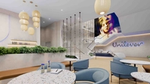 Rendering of lobby of Unilever’s new Global Innovation Center. Modern and warm looking entrance with greenery, fun lighting, and Unilever loco in blue lights.